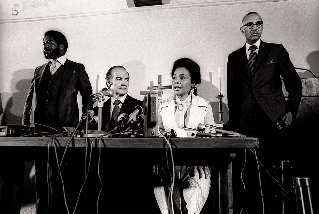 Sen. at a press conference with Coretta Scott King